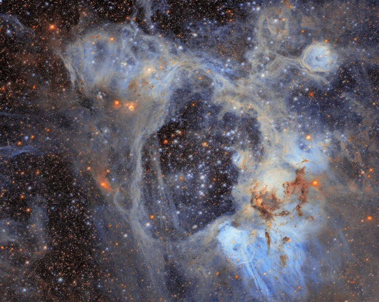 Colorful and intricate superbubble pattern with swirling shapes and vibrant hues, resembling a cosmic or abstract art scene.