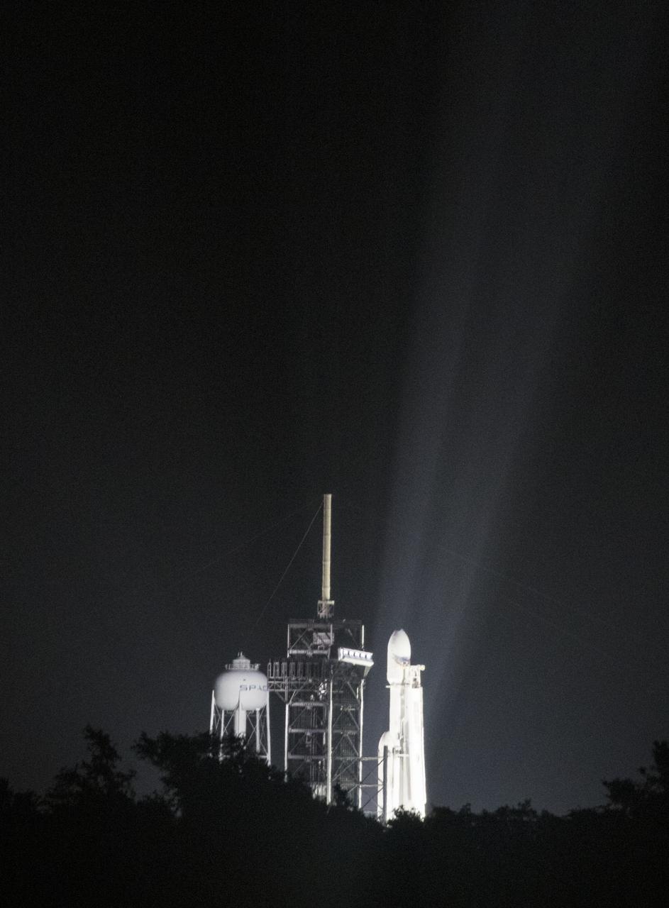 Falcon Heavy on Launch Complex 39A at night ahead of the STP-2 mission